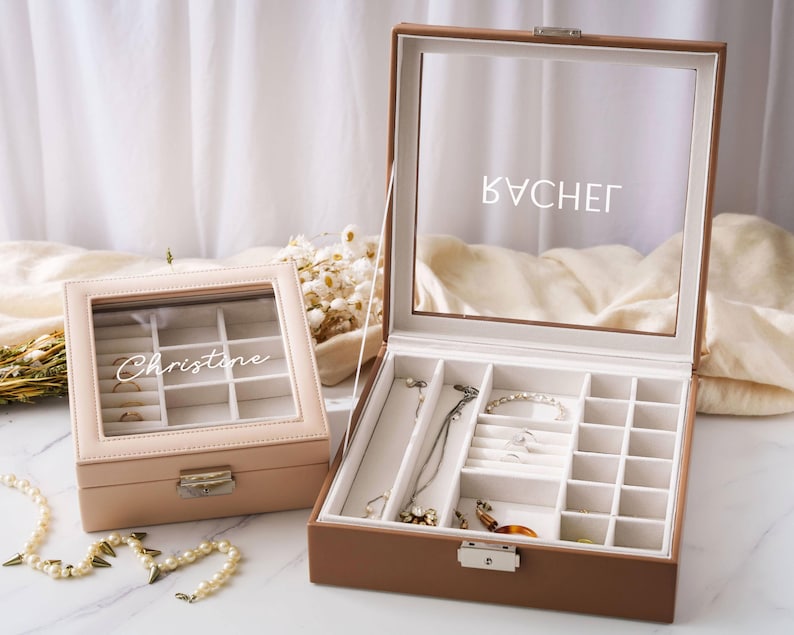 an open jewelry box sitting on top of a table