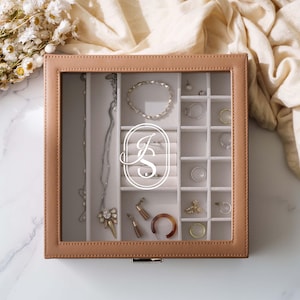 a box of jewelry sitting on top of a table