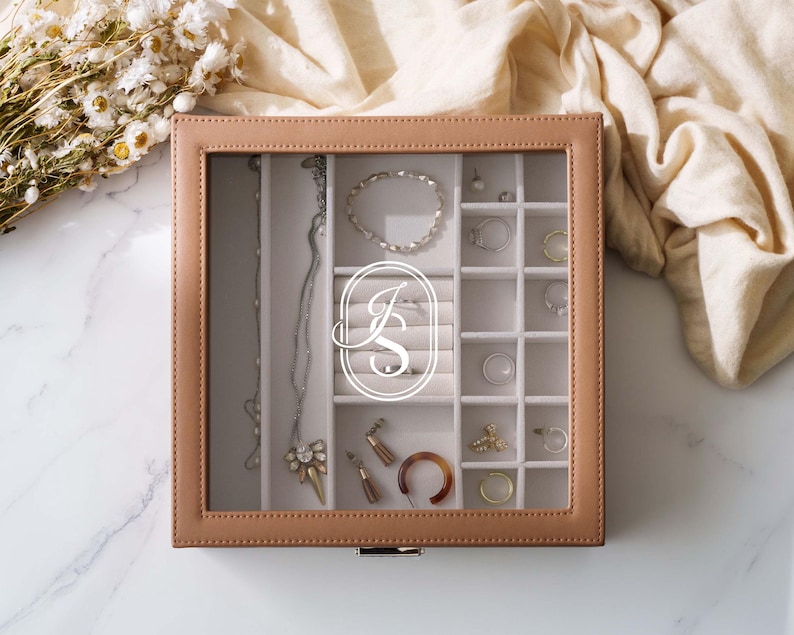 a box of jewelry sitting on top of a table