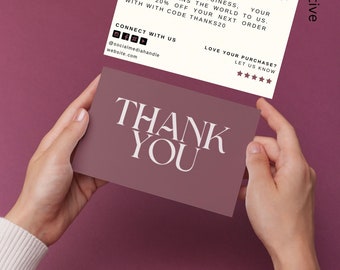 May include: A white thank you card with a pink background. The card says "Thank You for shopping with us" and "As a small business, your support means the world to us. Enjoy 20% off your next order with code THANKS20". The card also has social media icons and a website address.