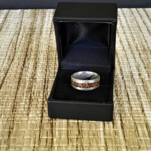 Custom Ring Damascus Steel Core with Crushed Opel Inlay. Very Nice Designed Piece of Jewelry Suitable for all Occasions. Size 7