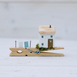 Clothes peg cottage. Driftwood scene.