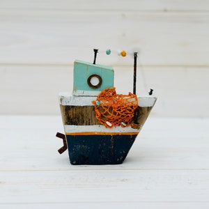 Fishing boat. Driftwood. Miniature.
