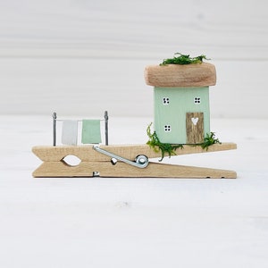 Clothes peg cottage. Driftwood scene.