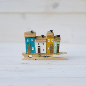 Clothes peg Coastal Village. Driftwood scene.