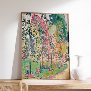 May include: A framed painting depicting a garden scene with trees and flowers in shades of pink, green, yellow, and blue. The painting is in a minimalist style with bold brushstrokes.