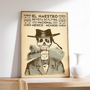 K&ouml;nnte beinhalten: Ein Vintage-Poster mit einem Skelett, das einen Hut tr&auml;gt und eine Zigarre raucht. Das Poster tr&auml;gt den Titel "El Maestro" und enth&auml;lt den Text "Revista Dcvltra Nacional Mexico MCMXXII".