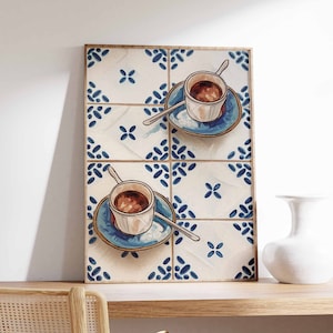 May include: A white and blue tiled background with two cups of coffee on saucers. The cups are white with brown coffee inside. The saucers are blue and white with a floral pattern.
