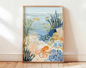 May include: A framed art print depicting an underwater scene. The artwork features an orange octopus, coral, and various marine plants in shades of blue, green, and peach. The background shows the ocean with fish and the sky.