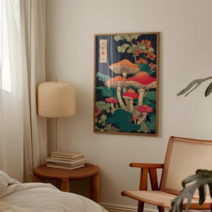 May include: A framed art print featuring a colourful illustration of mushrooms. The artwork showcases orange and red mushroom caps with white stems, set against a dark blue background with green foliage and Japanese text.