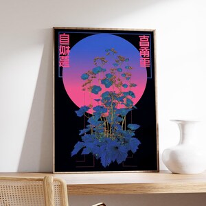 May include: A framed art print featuring a stylized botanical illustration. The artwork showcases blue and teal foliage against a gradient background of pink and blue, with Japanese text on the sides. A white vase sits on a wooden surface.