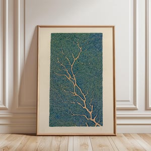 May include: A framed art print featuring a detailed illustration of a tree with a network of branches. The artwork has a teal and beige color palette, with the tree's branches in a light beige hue against a textured teal background.