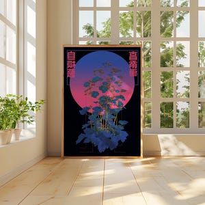 May include: A framed art print featuring a stylized floral design against a gradient pink and blue circle on a black background. Japanese characters are on the sides. The artwork is displayed in a bright room with a window and plants.