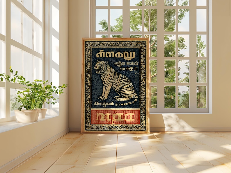 May include: A framed vintage poster featuring a tiger illustration. The tiger is depicted in a seated position with a detailed striped pattern. The poster has text in a foreign language and is set against a dark blue background with a decorative border.