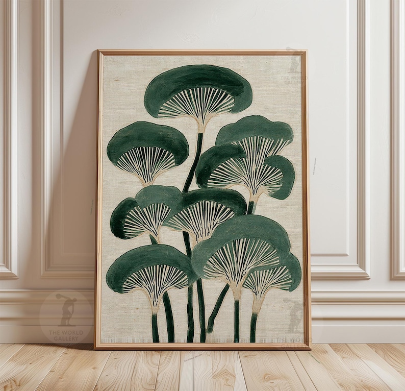 May include: A framed botanical print featuring a cluster of stylized green mushrooms with white linear details against a neutral background. The artwork is in a wooden frame, adding a touch of natural elegance to the decor. The World Gallery logo is in the bottom left corner.