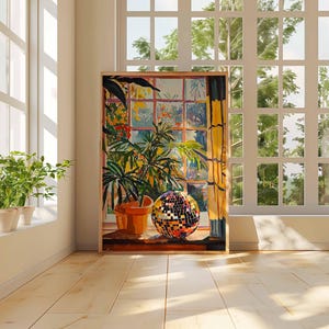 May include: A painting of a window with a view of trees and a disco ball on a table in front of a potted plant.