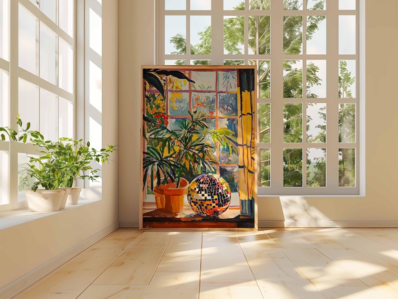 May include: A painting of a window with a view of trees and a disco ball on a table in front of a potted plant.
