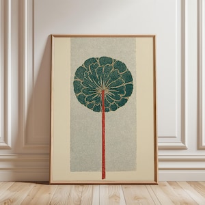 May include: A framed botanical print depicting a teal flower with a red stem against a dotted grey backdrop. The artwork is set within a light beige rectangular border and a natural wood frame, ideal for wall decor, with a minimalist aesthetic.