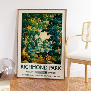 May include: A vintage poster advertising Richmond Park in London, England. The poster features a green and brown landscape with trees and a river. The text on the poster reads "Richmond Park" and "Nearest Underground Station District Line - Richmond Station - TW9 1DN".