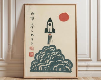 Op de afbeelding: Ingelijste kunstafdruk met een zwarte raket die opstijgt uit een wolk van donkergroene rook, met een rode zon op de achtergrond. Japanse karakters zijn aan de linkerkant afgedrukt. Het kunstwerk zit in een houten lijst.