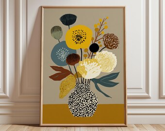 May include: A framed art print featuring a stylized floral arrangement. The bouquet includes yellow, brown, and blue flowers in a vase with a black and white spotted pattern. The background is a neutral tan with a mustard yellow stripe.