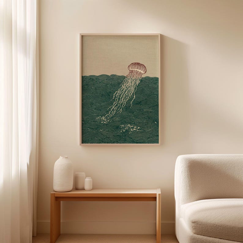 May include: A framed print featuring a jellyfish in a dark green ocean. The jellyfish is depicted with a reddish-brown bell and long, flowing tentacles. The artwork has a vintage aesthetic, with a light beige sky.
