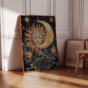May include: A vintage-style illustration of a sun and moon with a celestial theme. The sun has a human face with closed eyes and is surrounded by golden rays. The moon is a crescent shape with a gold outline. The background is a dark blue with stars and floral elements.