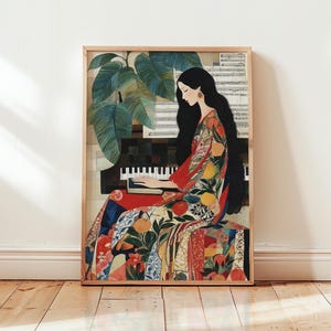 May include: A framed art print showing a person playing a piano. The person is wearing a patterned robe with oranges and leaves. A large green plant and sheet music are in the background. The artwork is in a wooden frame.