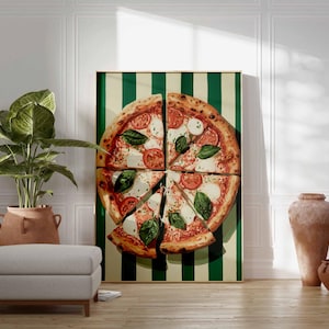 May include: A large framed pizza art print. The pizza is sliced and topped with tomatoes, mozzarella, and basil. The background is a green and cream striped pattern. The print is displayed in a room with a plant, ottoman, and decorative vases.