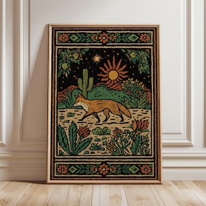 May include: A framed art print featuring a stylized desert landscape with a fox. The artwork showcases a fox walking across a sandy area, with a cactus, mountains, and a sun in the background. The color palette includes orange, green, and black.