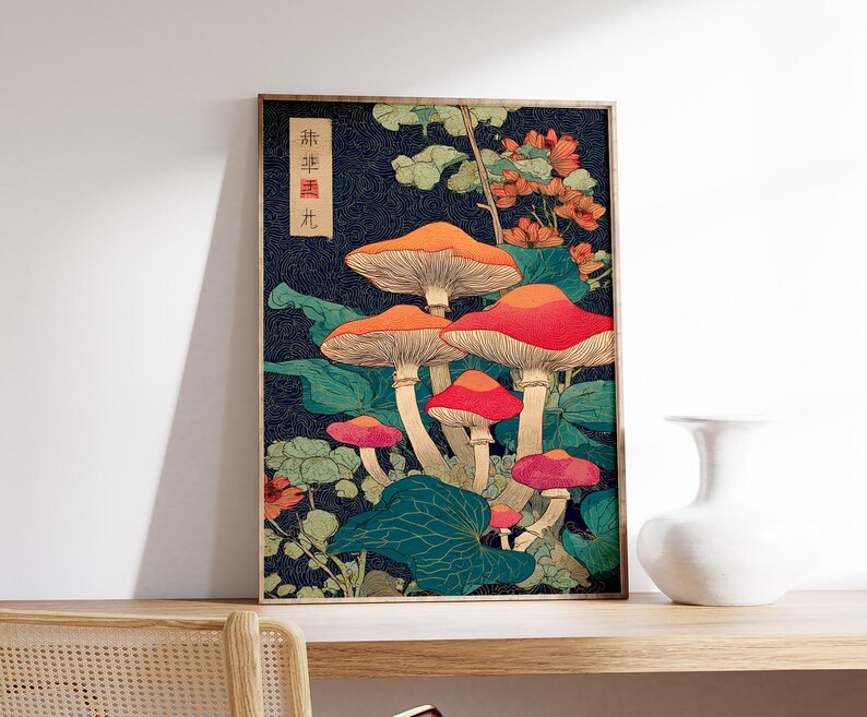 May include: A framed art print with a vintage illustration of mushrooms in red, orange, and pink, set against a dark blue background with green foliage. The artwork has a vintage aesthetic and includes Japanese text.