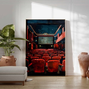 May include: A painting of a movie theater interior with red seats facing a large screen. The theater is empty and the screen is blank. The painting is framed in gold.