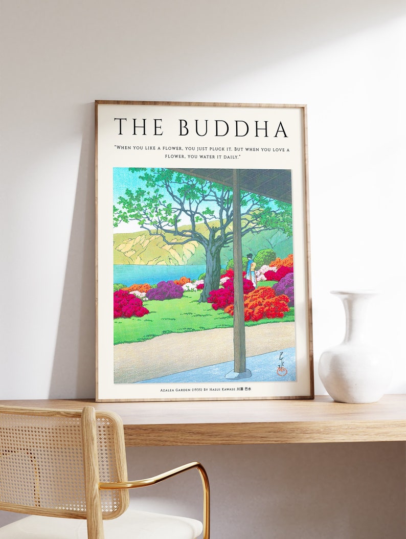 May include: A framed print of a Japanese woodblock print depicting a garden scene with a quote by the Buddha. The quote reads "When you like a flower, you just pluck it. But when you love a flower, you water it daily." The print is titled "Azalea Garden 19350 by HAJIME KAWASE".