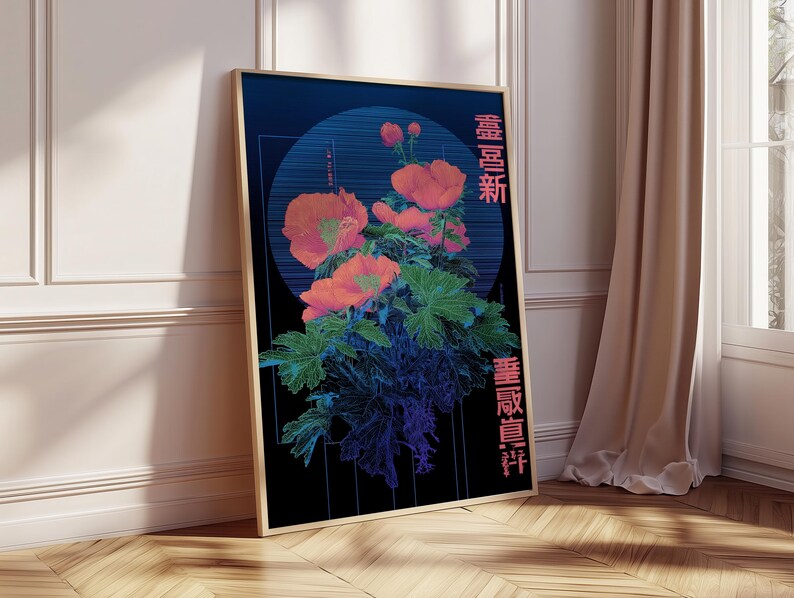 May include: Framed art print featuring a floral design with orange flowers and green leaves against a dark blue background. The artwork includes Japanese text in pink and a circular design element. The frame is a light brown color.