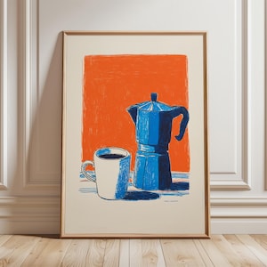 May include: Framed art print depicting a blue coffee pot and a white mug, set against an orange backdrop. The artwork uses a minimalist style with bold lines and shadows. The print is a stylish addition to any kitchen or dining area.