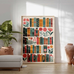 May include: A framed print with a colorful design of books and flowers. The books are stacked in rows and have different colors and patterns. The flowers are in various shades of pink, red, and orange.