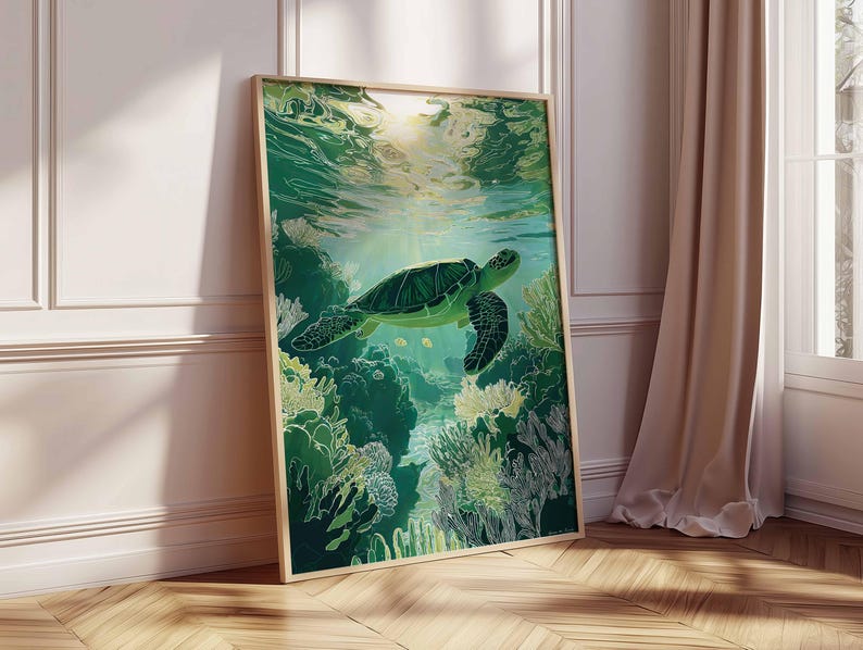May include: A framed art print featuring a green sea turtle swimming underwater. The artwork depicts the turtle above a coral reef, with sunlight filtering through the water. The frame is a light wood color, and the overall theme is marine life.