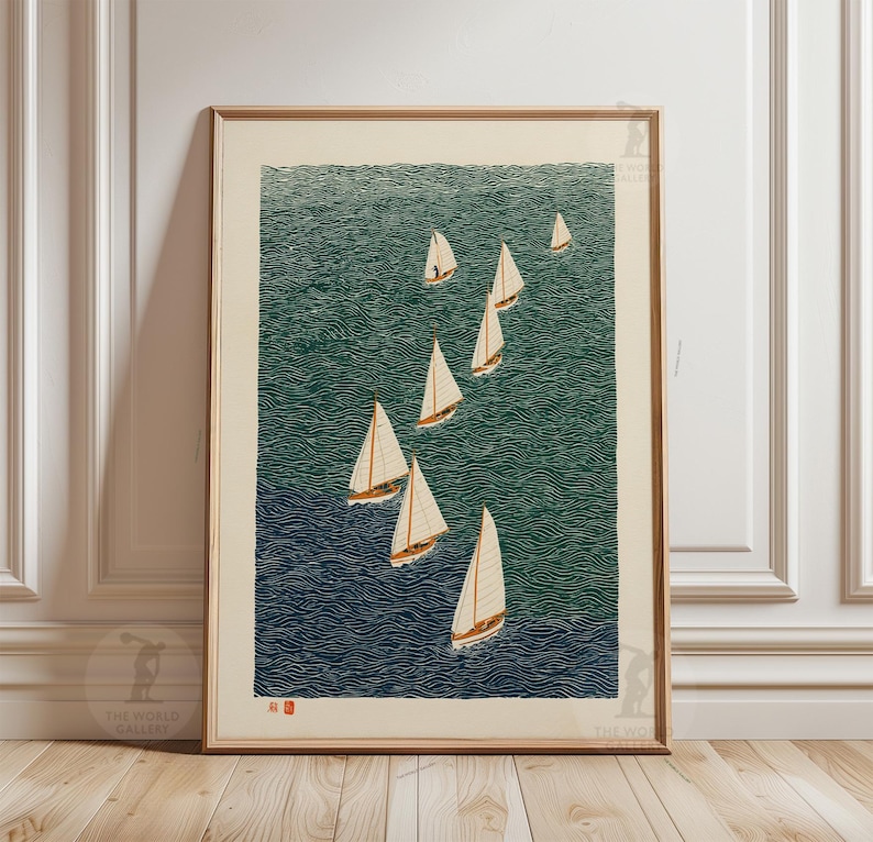 May include: A framed print featuring a fleet of sailboats on a teal-green sea. The boats have white sails and brown masts, set against a textured water background. The artwork is in a vintage style, with a wooden frame.