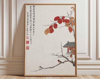 May include: A framed print of a traditional Japanese painting. The artwork depicts a branch with red and orange leaves, a small building, and two birds perched on a branch. The print has Japanese characters in the upper left corner.