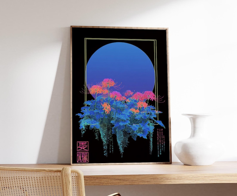 May include: Framed art print featuring a stylized floral design with a blue gradient circle on a black background. The flowers are pink and orange, with blue foliage. Japanese characters are in the lower left corner. The print is displayed on a wooden shelf.