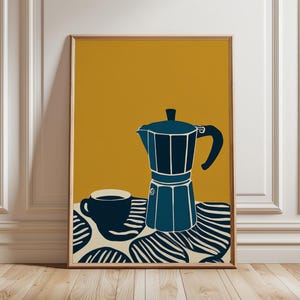 May include: Framed art print depicting a blue coffee maker and cup on a patterned surface, set against a mustard yellow backdrop. The minimalist illustration is suitable for kitchen or dining room decor, adding a touch of style.