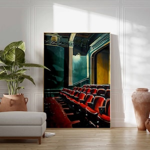 May include: A painting of a theater interior with rows of red seats. The seats are empty and the stage is dark. The painting is framed in gold.