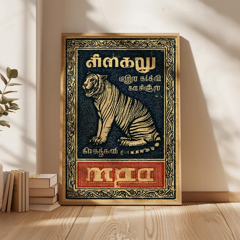 May include: A framed vintage-style poster featuring a detailed illustration of a tiger. The tiger is depicted in a seated position with a golden-yellow and black striped pattern against a dark blue background. The poster includes text in a foreign language.