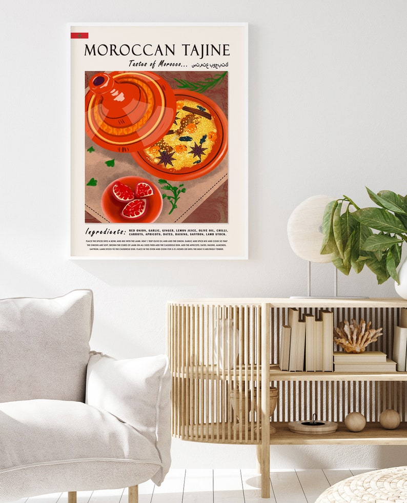 May include: A poster with a colorful illustration of a Moroccan tagine, a traditional clay pot used for cooking. The poster features the text "Moroccan Tajine" and "Taste of Morocco..." in a modern font. The ingredients for the dish are listed below the image.