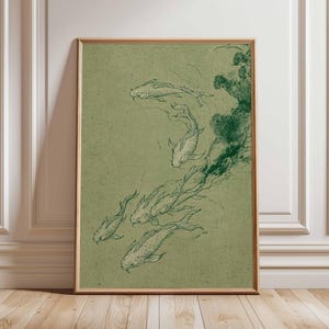 May include: A framed art print featuring a sketch of koi fish swimming in a pond. The artwork is rendered in dark green on a light green background. The frame is a light brown color.