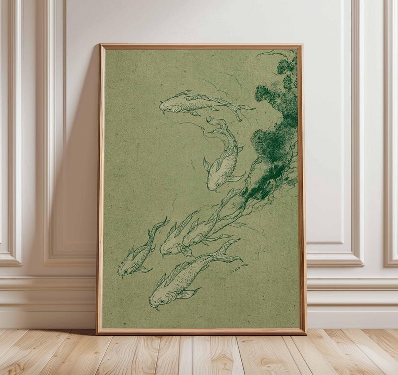 May include: A framed art print featuring a sketch of koi fish swimming in a pond. The artwork is rendered in dark green on a light green background. The frame is a light brown color.