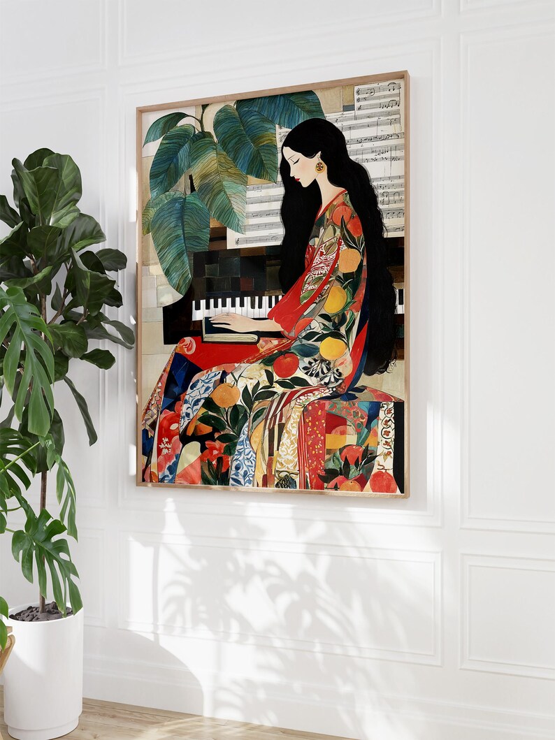 May include: A framed art print showing a woman playing a piano. She is dressed in a colourful patterned gown with fruit motifs. The artwork includes a piano, sheet music, and large green leaves. The frame is a light brown colour.