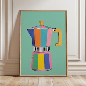May include: A framed print featuring a vibrant coffee maker design. The coffee maker is depicted with vertical stripes in pink, orange, blue, yellow, and green. The handle and top are a light wood colour, set against a teal backdrop.