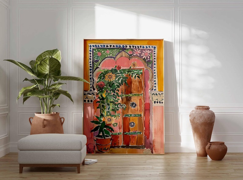 May include: A watercolor painting of a colorful door with a floral design. The door is painted in shades of pink, orange, and yellow, and the flowers are in shades of red, yellow, and green. The painting is framed in a simple wooden frame.