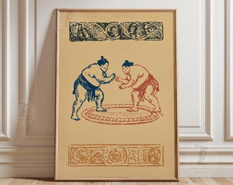 Könnte beinhalten: Gerahmter Druck mit einem Sumo-Ringer-Kampf. Zwei Sumōringer in blauen und roten Lendenschurzen stehen sich in einem Ring gegenüber. Der Druck hat dekorative Ränder und einen beigen Hintergrund. Das Logo The World Gallery ist sichtbar.